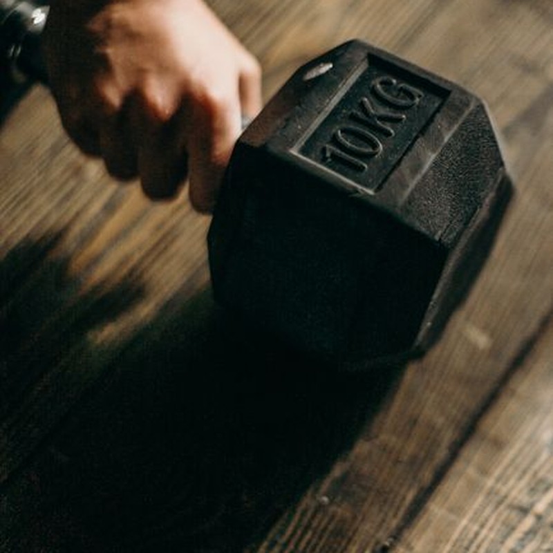 Setting Up: Load the Dumbbells and Brace Your Core