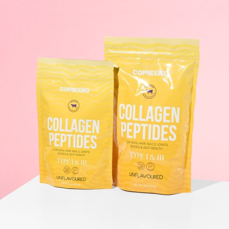 Bright product shot of collagen peptide supplements with pink background.