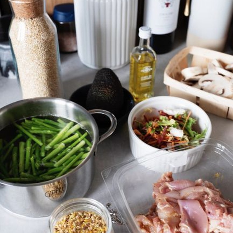 Various fresh ingredients for cooking in a home kitchen setting.